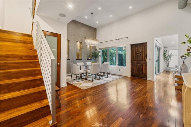 2531 N Commonwealth Ave, Los Angeles, CA 90027 - dining area with a high ceiling, stairway, hardwood / wood-style flooring, and recessed lighting
