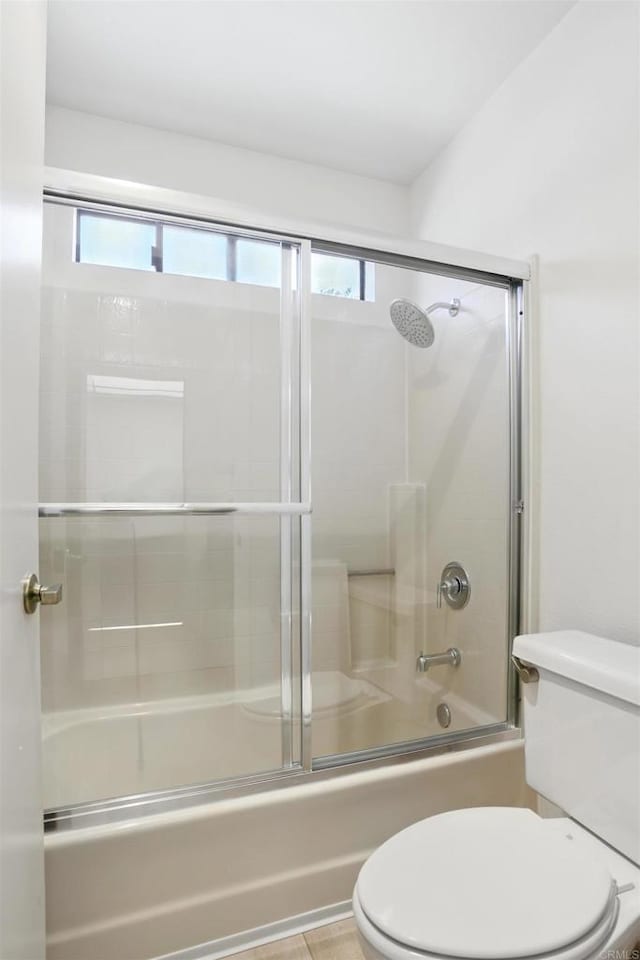 8373 Suntree Pl, San Diego, CA 92119 - bathroom featuring toilet and bath / shower combo with glass door