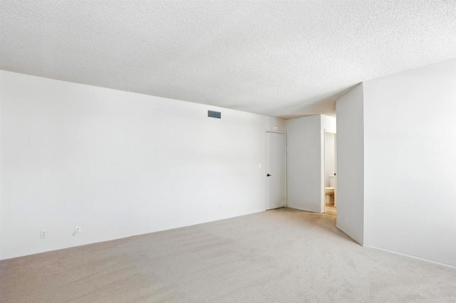 8373 Suntree Pl, San Diego, CA 92119 - spare room featuring light carpet and a textured ceiling