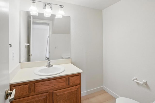 8373 Suntree Pl, San Diego, CA 92119 - half bath with vanity and wood finished floors
