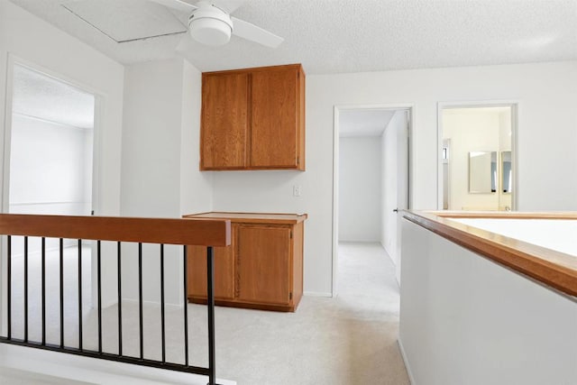 8373 Suntree Pl, San Diego, CA 92119 - hallway with light carpet and baseboards