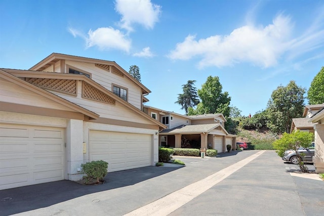 8373 Suntree Pl, San Diego, CA 92119 - view of front of property with a garage