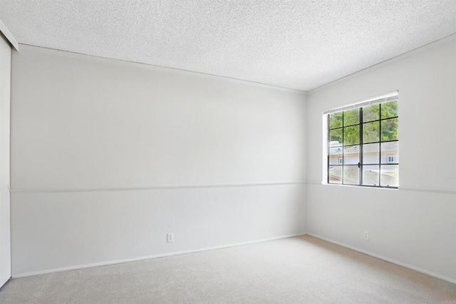 8373 Suntree Pl, San Diego, CA 92119 - carpeted empty room with a textured ceiling and baseboards