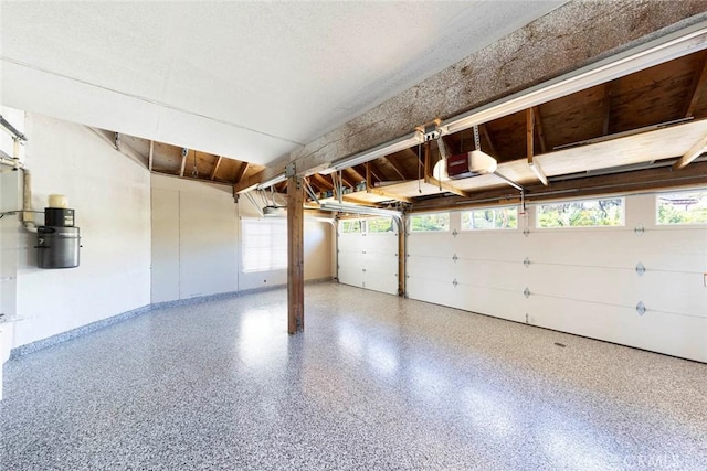 4 Narbonne, Laguna Niguel, CA 92677 - garage featuring a central vacuum unit and a garage door opener