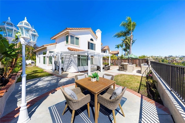 4 Narbonne, Laguna Niguel, CA 92677 - rear view of property with a pergola, a patio area, outdoor dining space, stucco siding, and a chimney