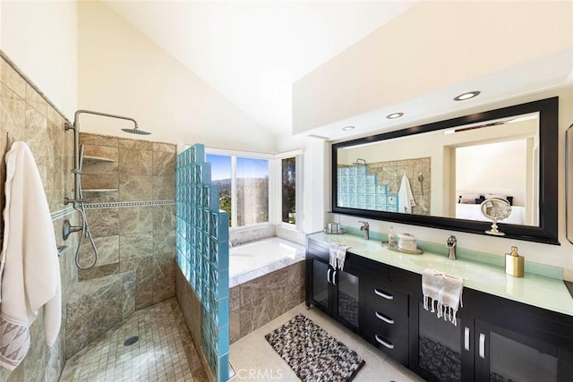 4 Narbonne, Laguna Niguel, CA 92677 - bathroom featuring a bath, double vanity, a walk in shower, lofted ceiling, and tile patterned flooring