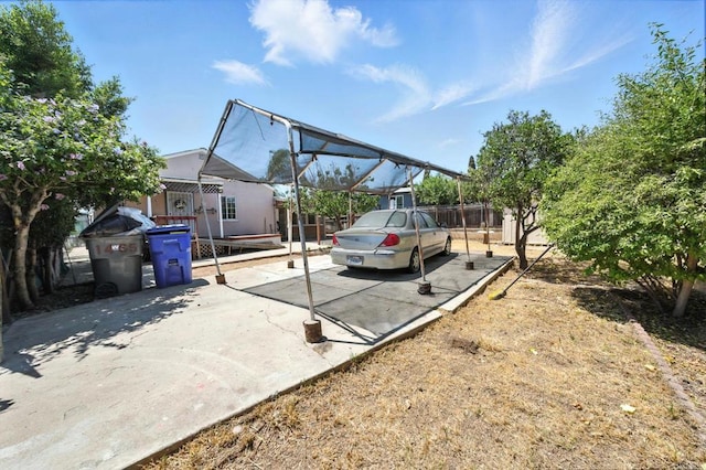 1465 S 43rd St, San Diego, CA 92113 - view of vehicle parking with a carport