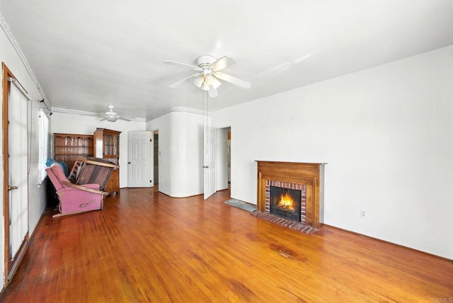 1465 S 43rd St, San Diego, CA 92113 - unfurnished living room with a ceiling fan, a fireplace, and wood finished floors