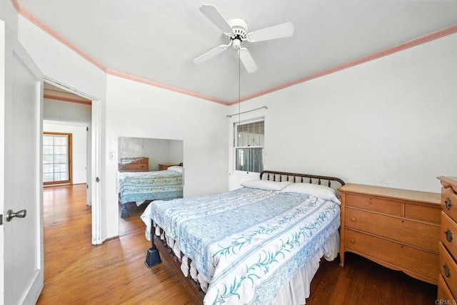 1465 S 43rd St, San Diego, CA 92113 - bedroom featuring wood finished floors, ornamental molding, and a ceiling fan
