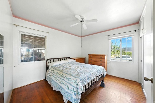 1465 S 43rd St, San Diego, CA 92113 - bedroom with wood finished floors, a ceiling fan, and crown molding