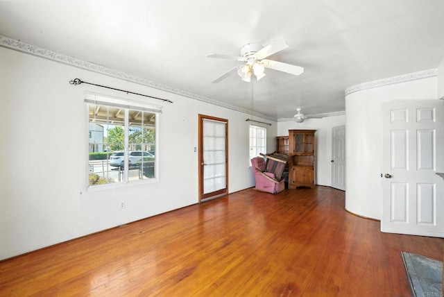 1465 S 43rd St, San Diego, CA 92113 - unfurnished living room with ceiling fan, wood finished floors, and crown molding