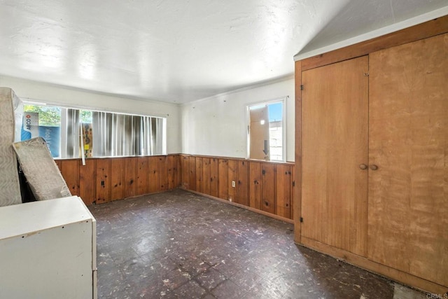 1465 S 43rd St, San Diego, CA 92113 - foyer entrance featuring tile patterned floors, wood walls, and wainscoting