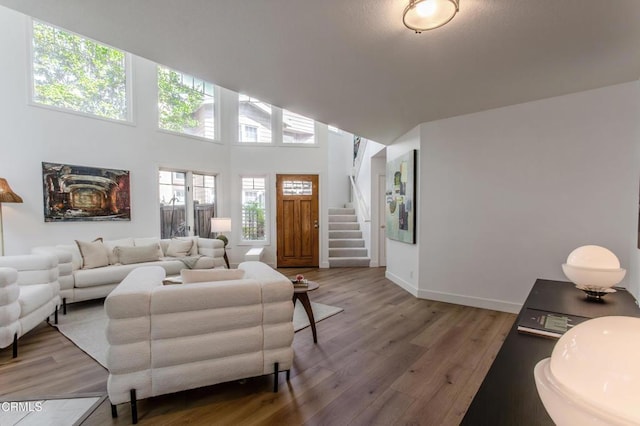 2759 Butter Creek Dr, Pasadena, CA 91107 - living area featuring stairway, wood finished floors, and a high ceiling