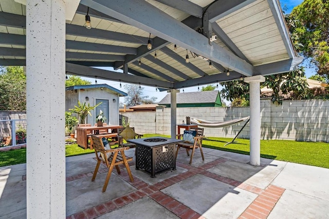 4624 Katherine Place, La Mesa, CA 91942 - view of patio / terrace featuring a fire pit and a storage unit