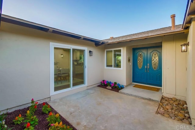 6947 Wallsey Dr, San Diego, CA 92119 - doorway to property with a patio area and stucco siding