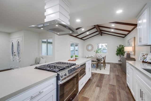 6947 Wallsey Dr, San Diego, CA 92119 - kitchen with stainless steel appliances, dark wood-style floors, light countertops, white cabinetry, and recessed lighting