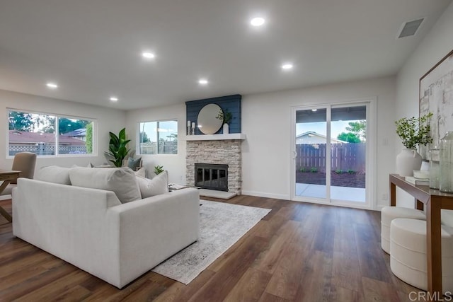 6947 Wallsey Dr, San Diego, CA 92119 - living room with dark wood-style flooring, a fireplace, and recessed lighting