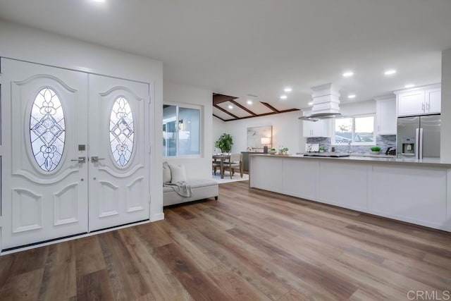 6947 Wallsey Dr, San Diego, CA 92119 - foyer entrance featuring wood finished floors and recessed lighting