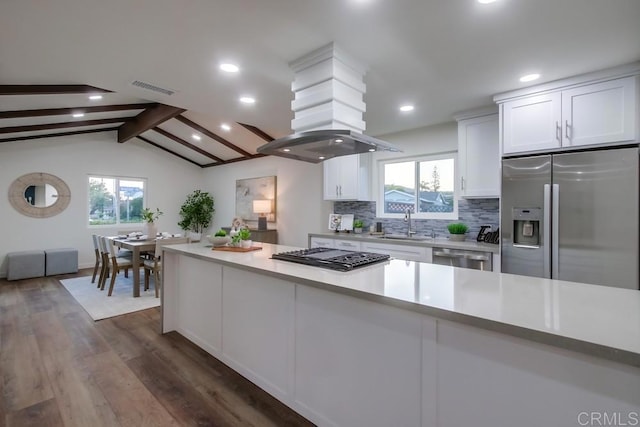 6947 Wallsey Dr, San Diego, CA 92119 - kitchen with appliances with stainless steel finishes, white cabinets, dark wood-style flooring, decorative backsplash, and recessed lighting