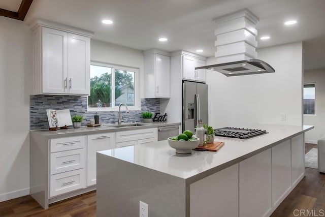6947 Wallsey Dr, San Diego, CA 92119 - kitchen with appliances with stainless steel finishes, tasteful backsplash, white cabinets, dark wood-type flooring, and recessed lighting