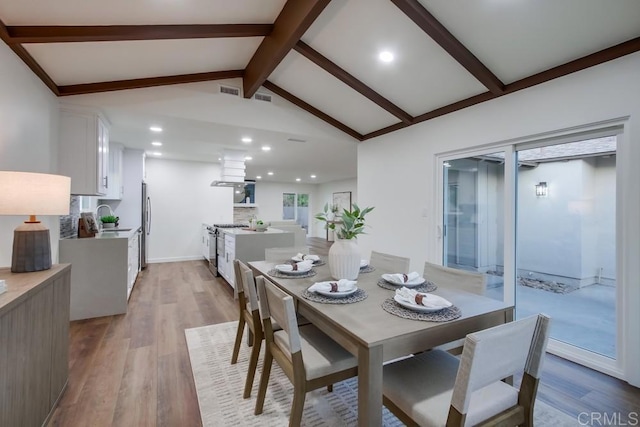 6947 Wallsey Dr, San Diego, CA 92119 - dining space with light wood finished floors and recessed lighting