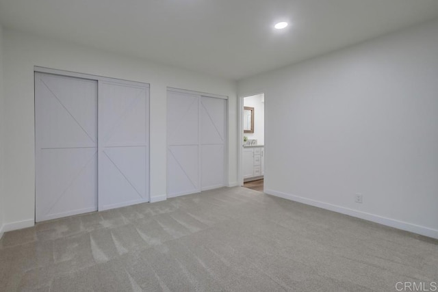6947 Wallsey Dr, San Diego, CA 92119 - unfurnished bedroom with carpet, recessed lighting, multiple closets, and ensuite bathroom