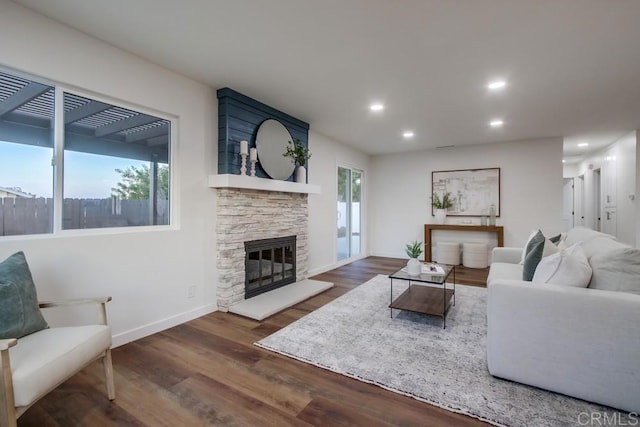 6947 Wallsey Dr, San Diego, CA 92119 - living room featuring wood finished floors, a stone fireplace, and recessed lighting