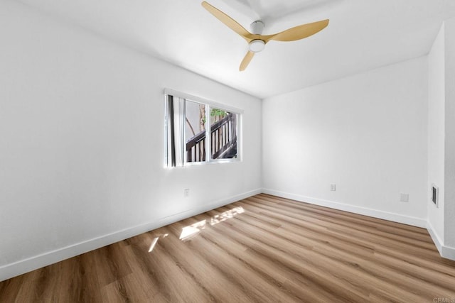 6735 Amherst St, San Diego, CA 92115 - empty room featuring wood finished floors and ceiling fan