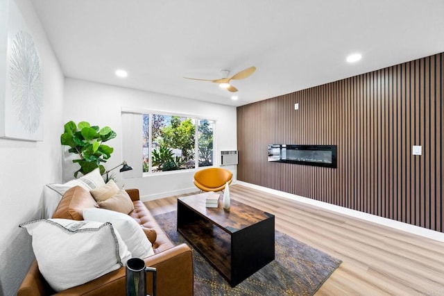 6735 Amherst St, San Diego, CA 92115 - living area featuring wood finished floors, ceiling fan, recessed lighting, and a glass covered fireplace