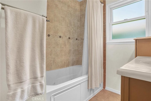 16918 Baltar St, Van Nuys, CA 91406 - bathroom featuring a combined bath / shower with jetted tub, vanity, and tile patterned floors