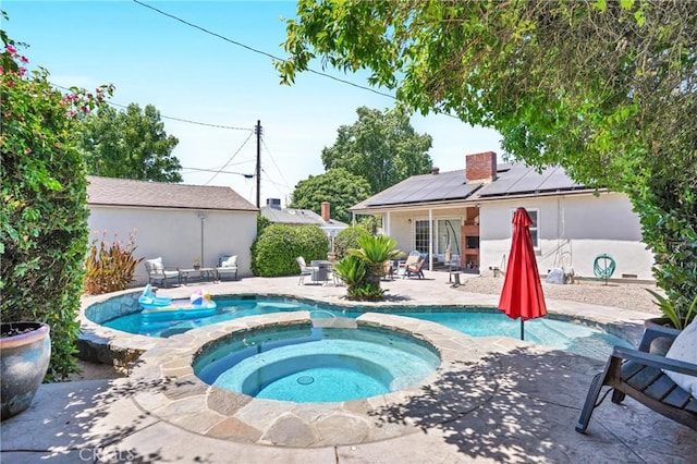 16918 Baltar St, Van Nuys, CA 91406 - view of swimming pool featuring a patio area and a pool with connected hot tub