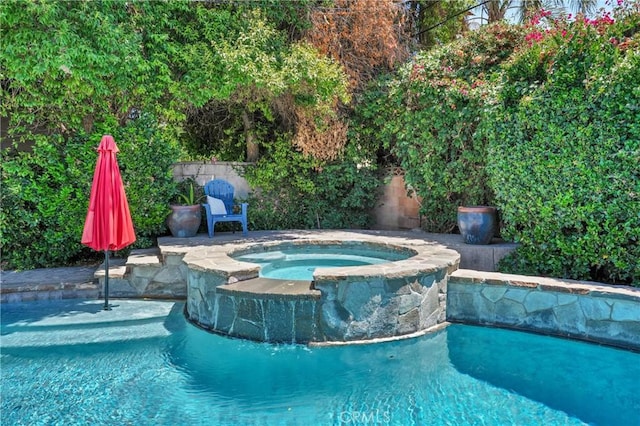 16918 Baltar St, Van Nuys, CA 91406 - view of swimming pool with a pool with connected hot tub