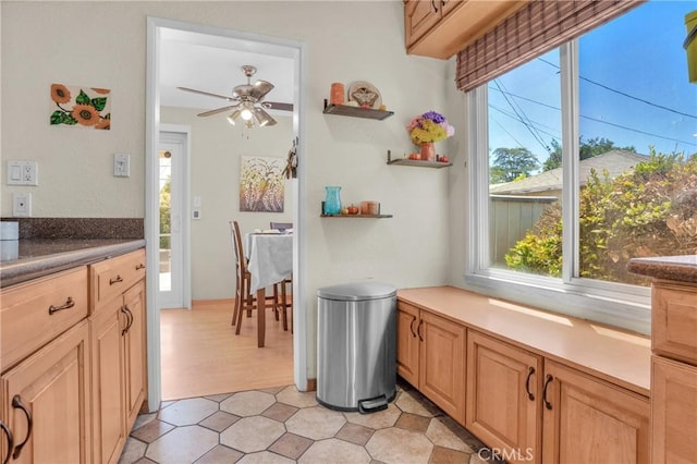 16918 Baltar St, Van Nuys, CA 91406 - kitchen with healthy amount of natural light, ceiling fan, and light brown cabinets