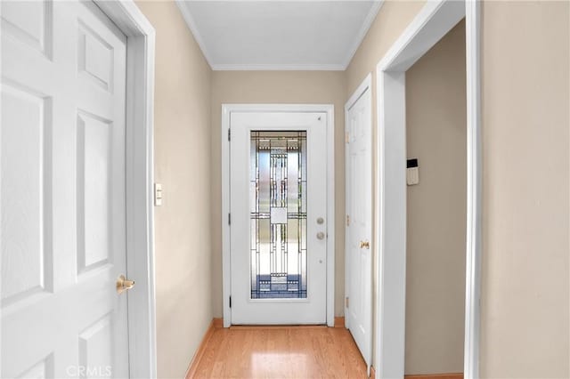 16918 Baltar St, Van Nuys, CA 91406 - doorway with crown molding and light wood finished floors