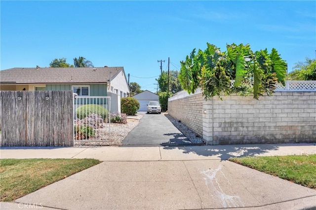 16918 Baltar St, Van Nuys, CA 91406 - view of side of home with a garage