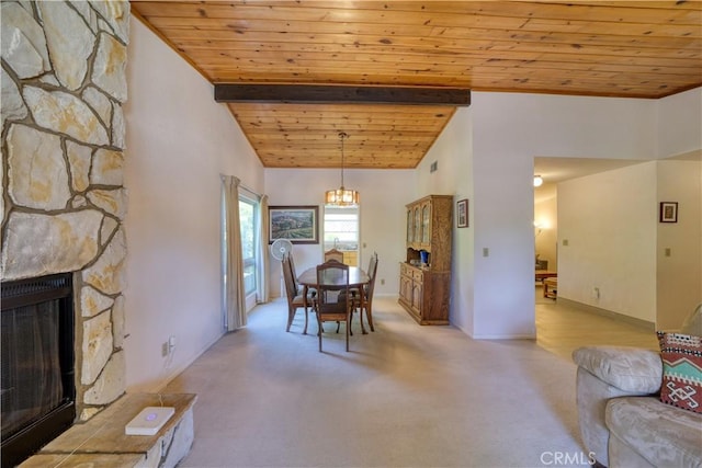 92 Mariposa Dr, San Luis Obispo, CA 93401 - dining room with a chandelier, wooden ceiling, light colored carpet, and a stone fireplace