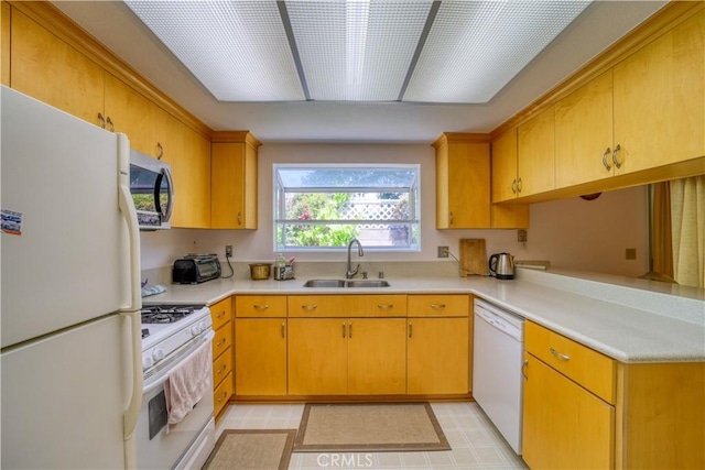 92 Mariposa Dr, San Luis Obispo, CA 93401 - kitchen with white appliances, light countertops, and light flooring