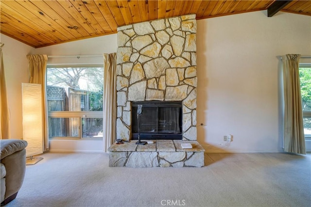 92 Mariposa Dr, San Luis Obispo, CA 93401 - unfurnished living room featuring wood ceiling, carpet floors, and a stone fireplace
