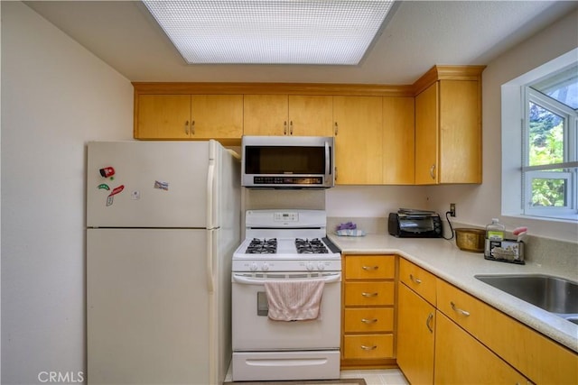92 Mariposa Dr, San Luis Obispo, CA 93401 - kitchen featuring white appliances and light countertops