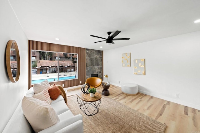 10350 Caminito Cuervo Unit 93, San Diego, CA 92108 - living room with a ceiling fan, recessed lighting, wood finished floors, and a high end fireplace