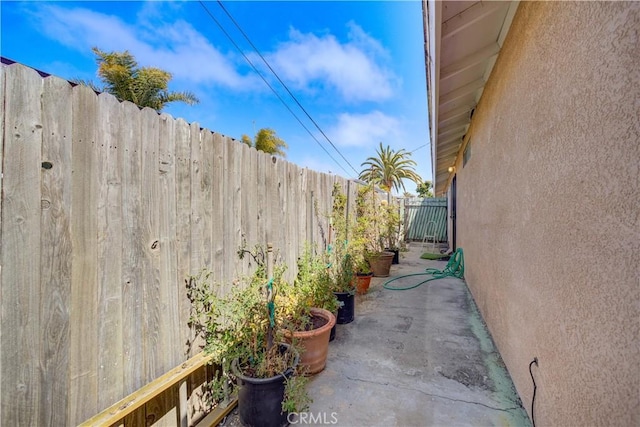 2120 Ocean St, Oceano, CA 93445 - view of home's exterior with a fenced backyard, stucco siding, and a patio