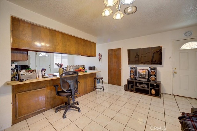 2120 Ocean St, Oceano, CA 93445 - office area featuring a textured ceiling and a chandelier