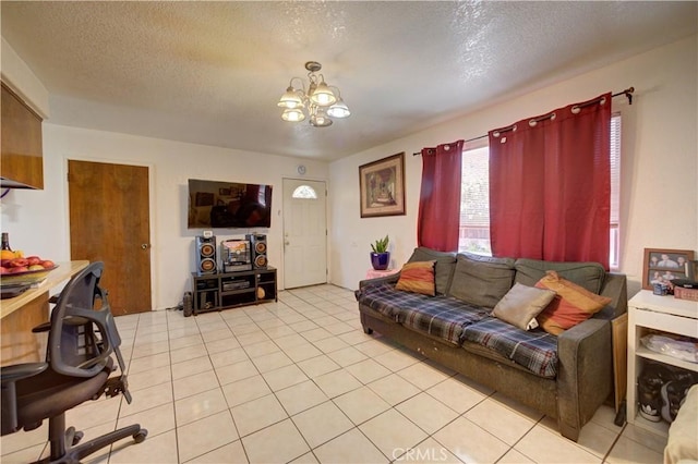 2120 Ocean St, Oceano, CA 93445 - living area with a chandelier, a textured ceiling, and light tile patterned floors