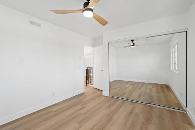 2858 Lehigh Ct, Oceanside, CA 92056 - unfurnished bedroom with light wood-style floors, a closet, and a ceiling fan