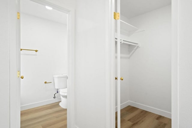 2858 Lehigh Ct, Oceanside, CA 92056 - walk in closet featuring wood finished floors