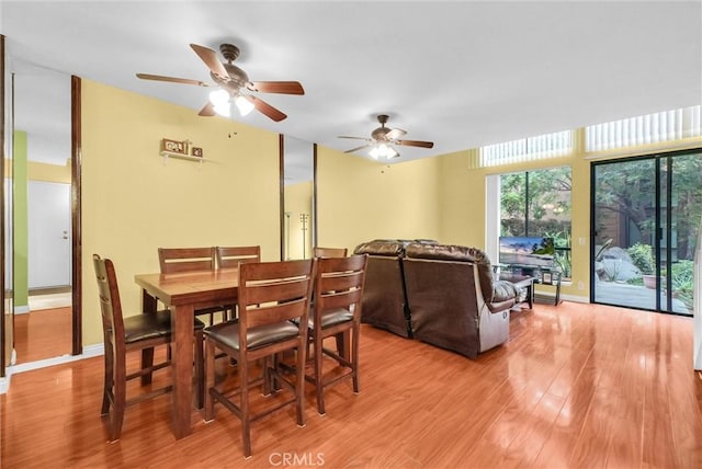 10642 Shoreline Dr Unit 80, Norwalk, CA 90650 - dining space with light wood finished floors and a ceiling fan