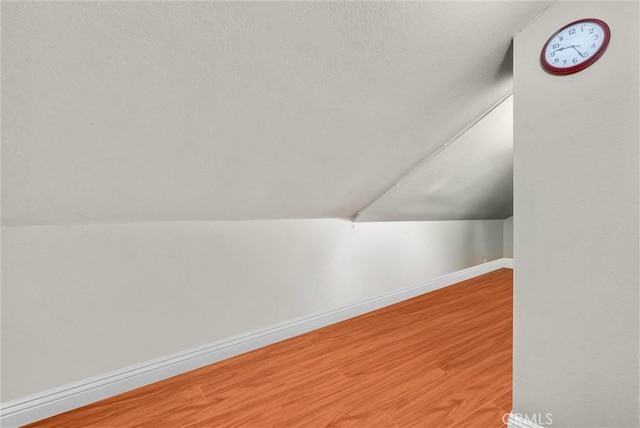 10642 Shoreline Dr Unit 80, Norwalk, CA 90650 - additional living space with wood finished floors and lofted ceiling
