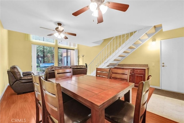 10642 Shoreline Dr Unit 80, Norwalk, CA 90650 - dining area with stairway and ceiling fan