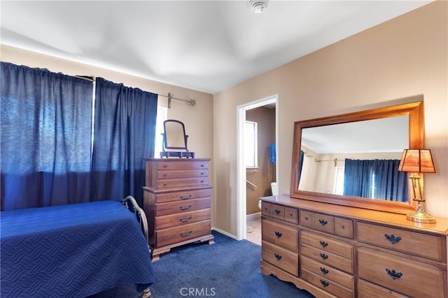 19955 Chickasaw Rd, Apple Valley, CA 92307 - bedroom with dark colored carpet and baseboards