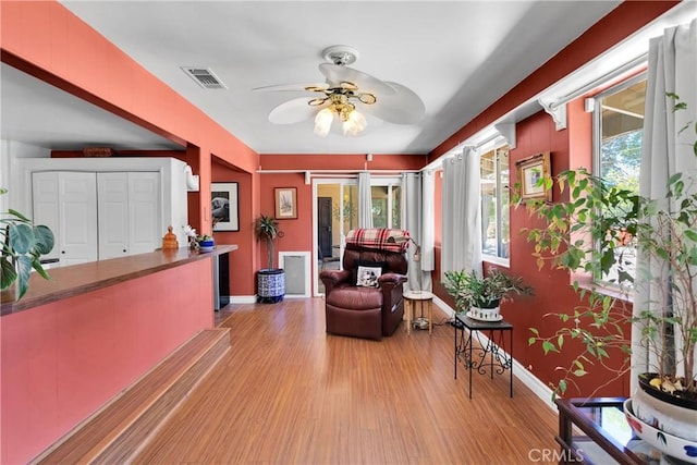 19955 Chickasaw Rd, Apple Valley, CA 92307 - sitting room featuring a ceiling fan and light wood-style floors